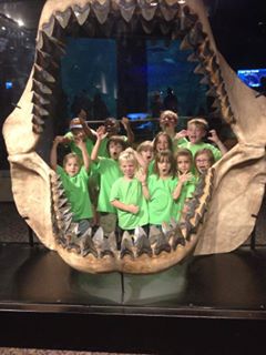 kids in a giant shark jaw